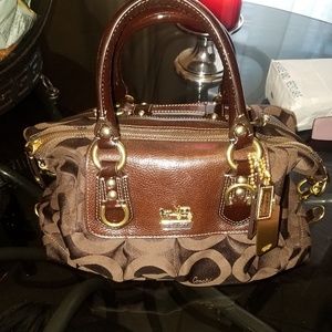 Coach brown purse. Double handle with adjustable l